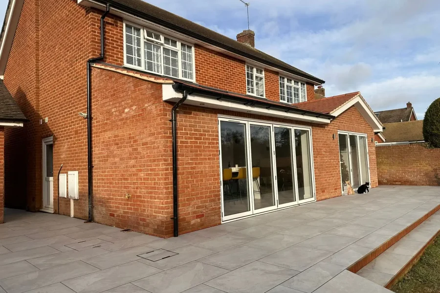 Rear extension with bifold doors and a porcelain patio